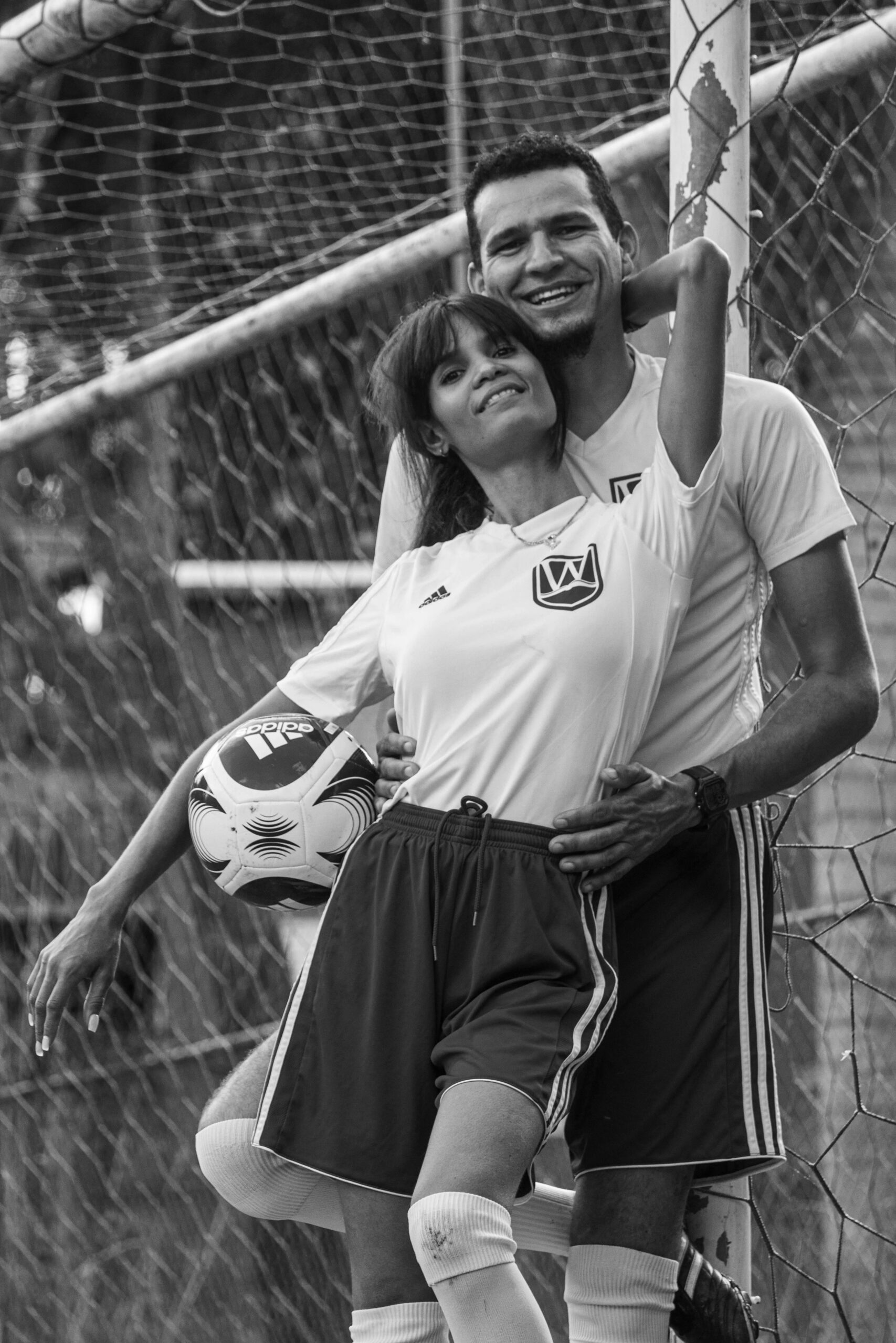 pareja en futbol